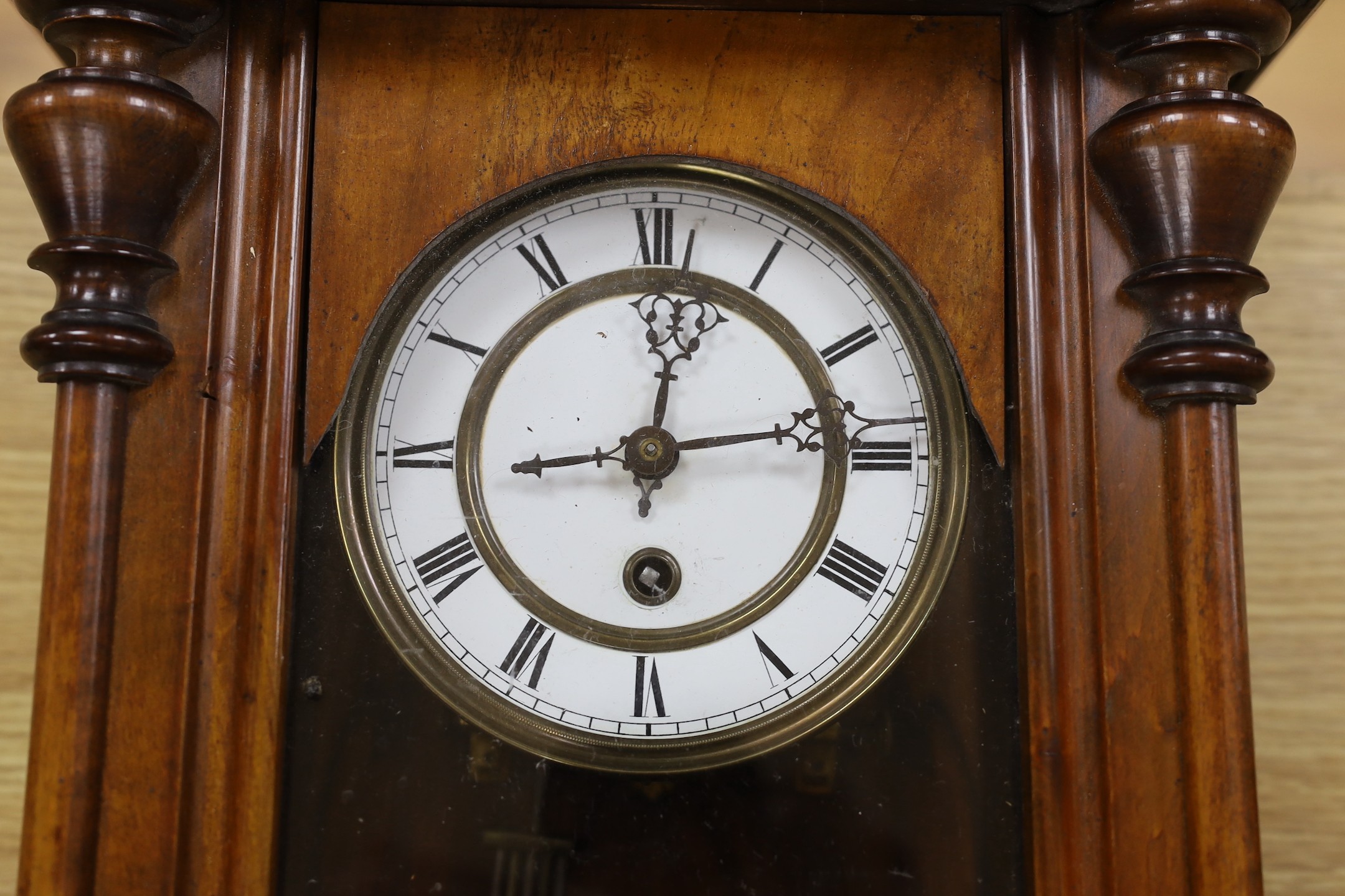 A 19th century German walnut wall timepiece, 89 cms high